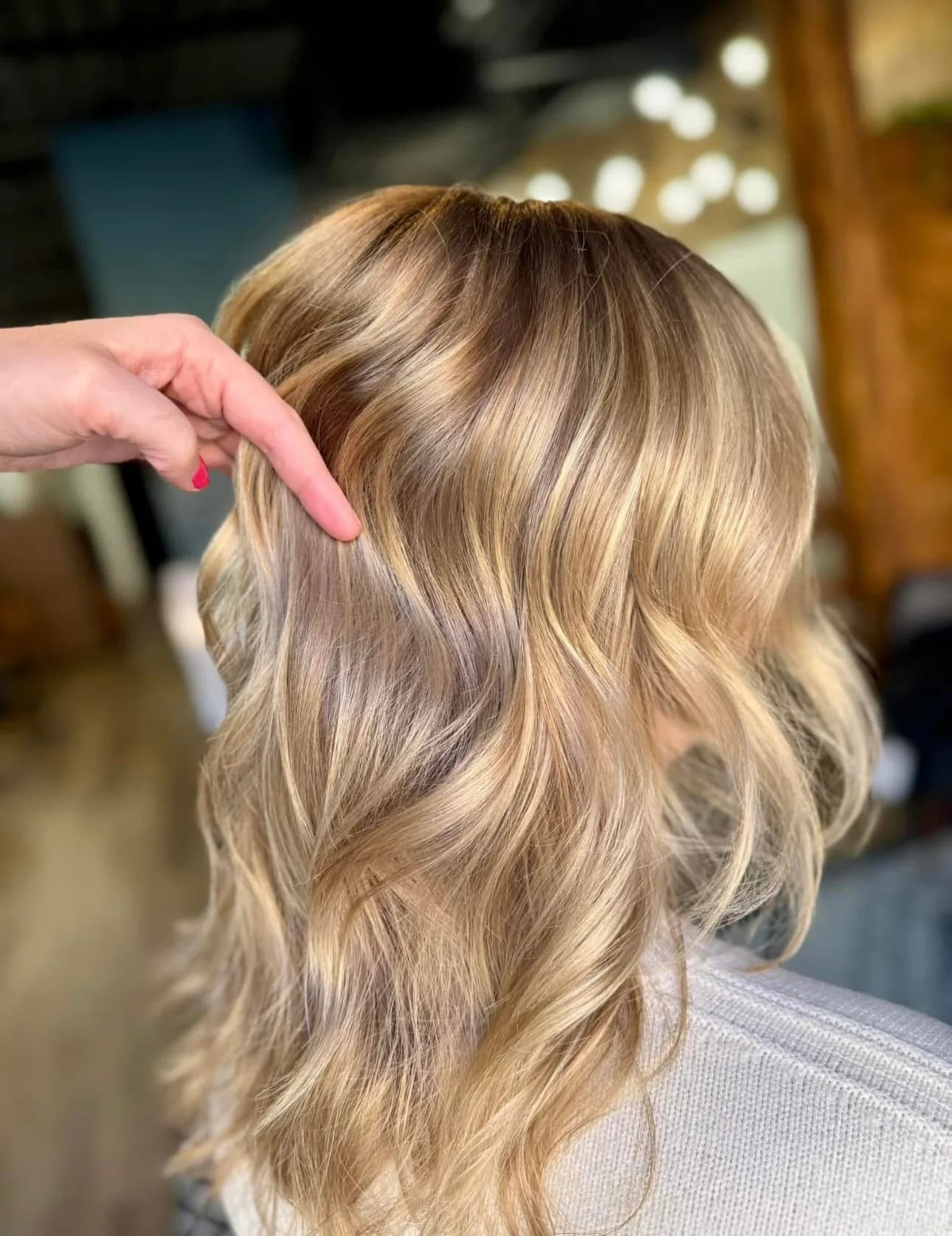 Dimensional blonde hair with soft waves