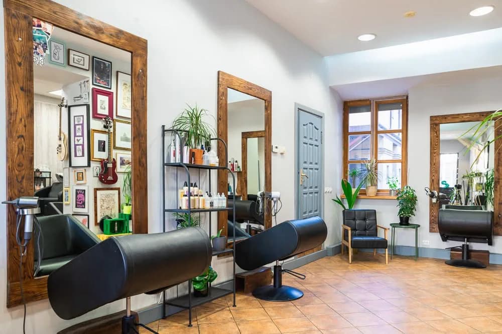 Salon 414 interior with wooden mirrors and styling chairs