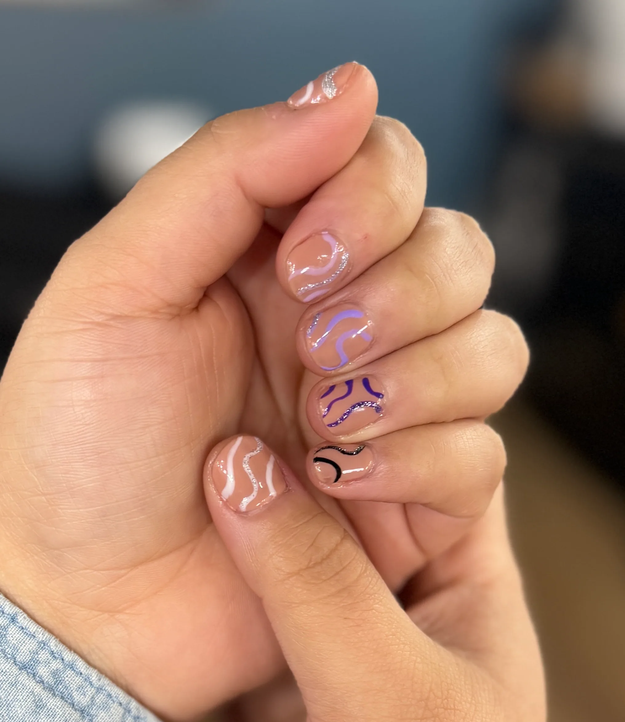 Creative nail art with pastel line details